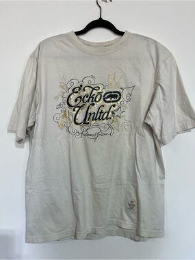 Ecko Unlimited Off-White Short Sleeve Tee with Gold and Black Logo